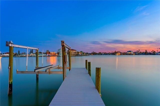 dock area featuring a water view and boat lift