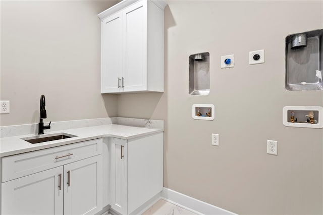 clothes washing area featuring a sink, marble finish floor, washer hookup, and electric dryer hookup