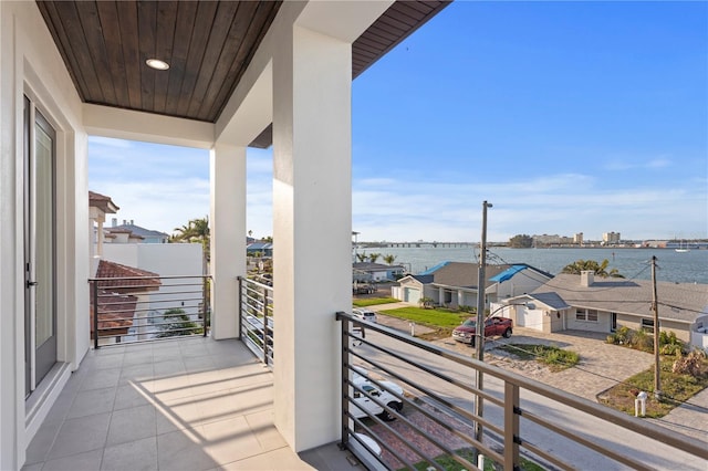 balcony featuring a water view