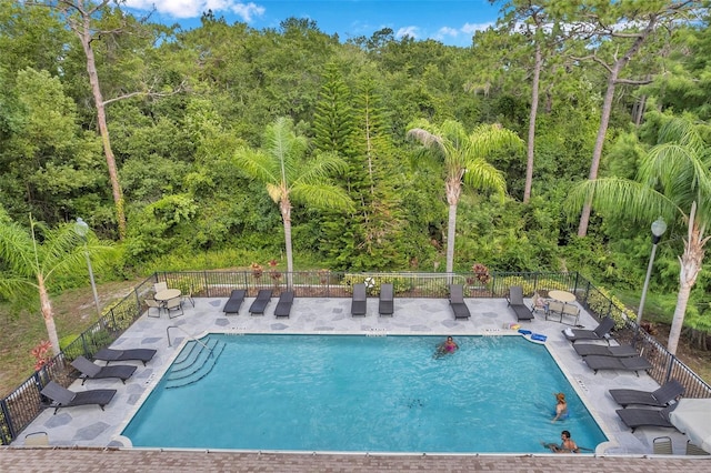 view of pool featuring a patio area