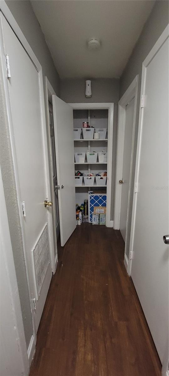 hall featuring dark hardwood / wood-style floors