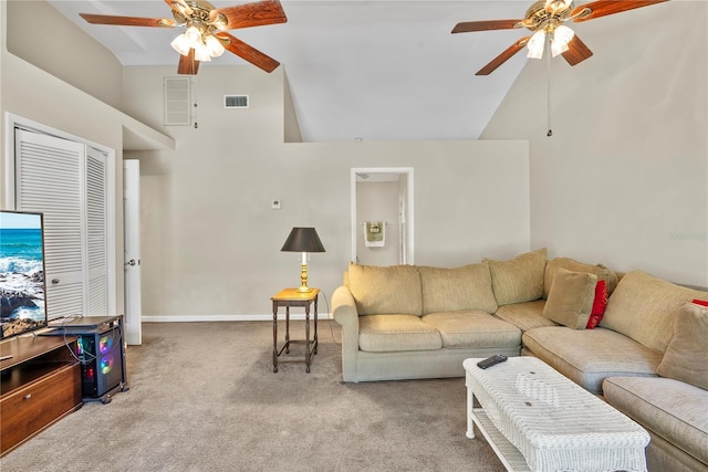 living room featuring high vaulted ceiling, carpet floors, and ceiling fan