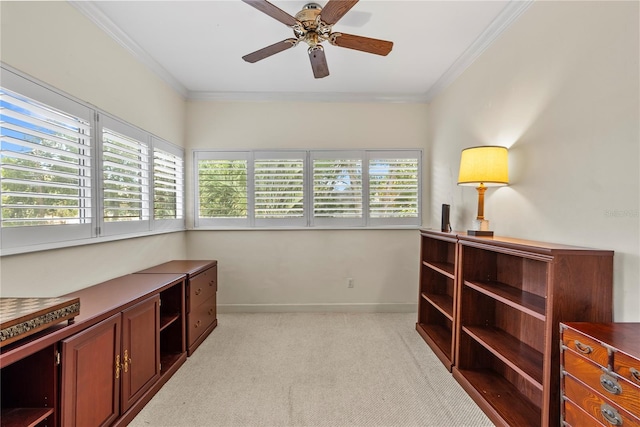 living area featuring crown molding, light colored carpet, and ceiling fan