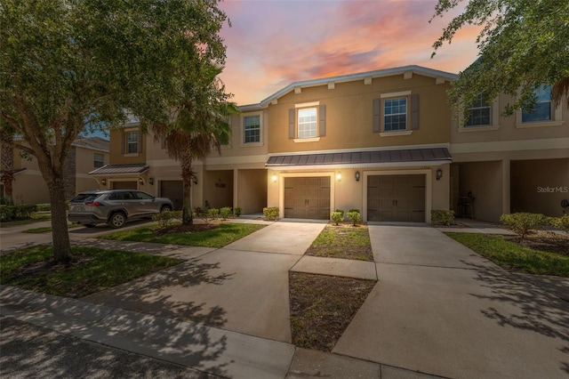 view of property featuring a garage