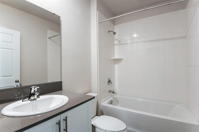 full bathroom featuring vanity, toilet, and tiled shower / bath combo