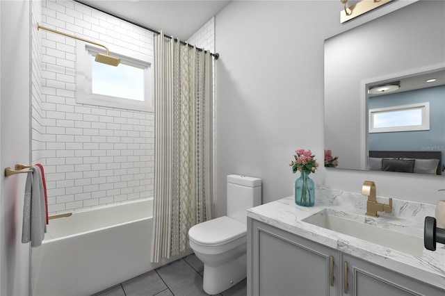 full bathroom featuring tile patterned floors, vanity, toilet, and shower / tub combo with curtain