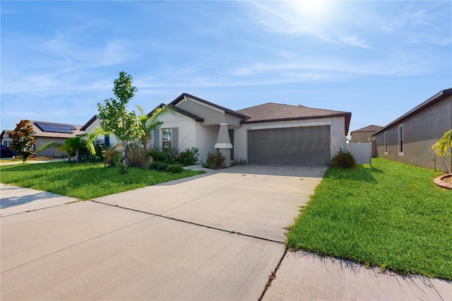 ranch-style house featuring driveway, a garage, a front lawn, and stucco siding