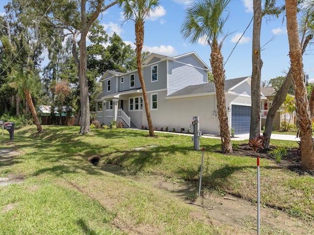 exterior space with a lawn and a garage