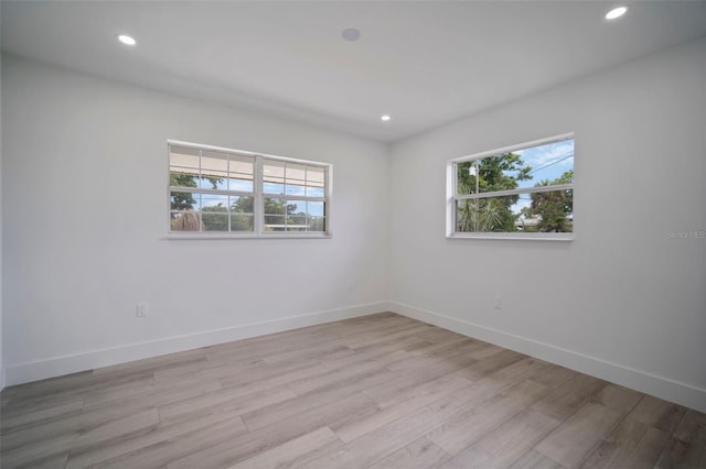 empty room with light wood-type flooring