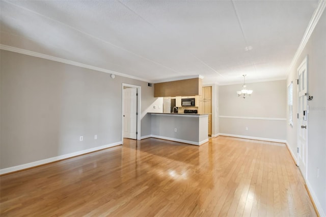 unfurnished living room featuring ornamental molding, a chandelier, light wood-style flooring, and baseboards