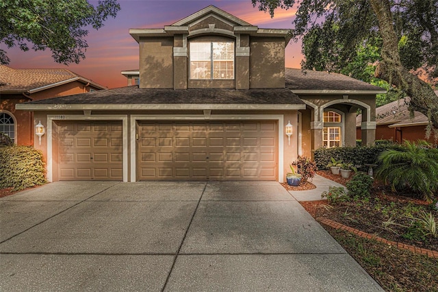 view of front of home with a garage