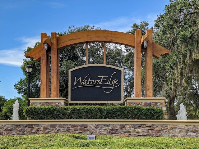 view of community sign