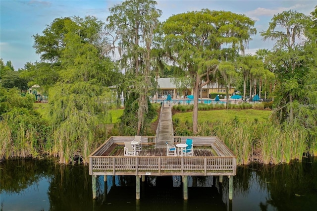 dock area featuring a water view