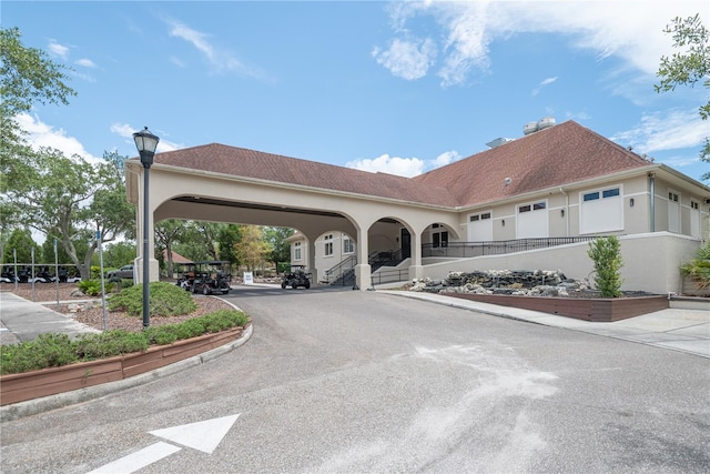 exterior space featuring a carport