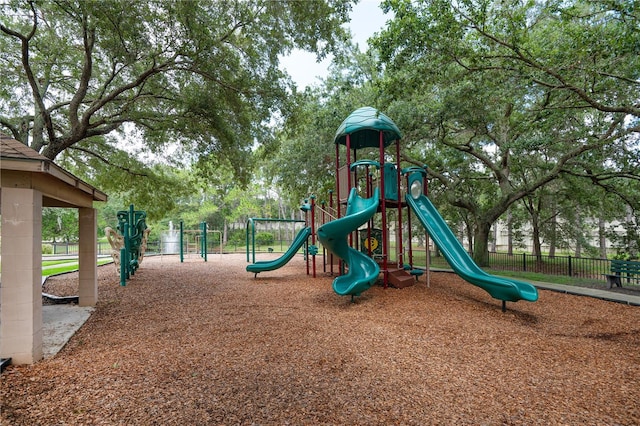 community jungle gym with fence