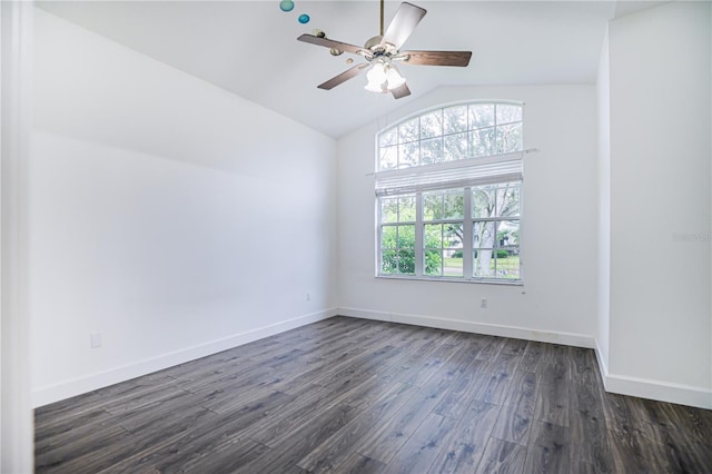 spare room featuring ceiling fan, dark wood-type flooring, and high vaulted ceiling