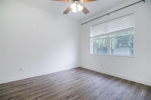 empty room featuring ceiling fan and hardwood / wood-style flooring