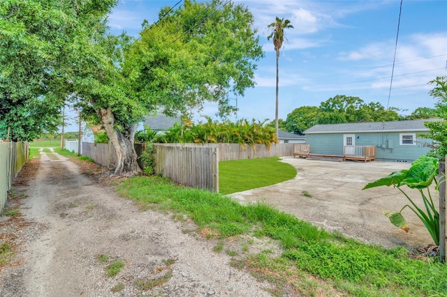 view of yard with a deck