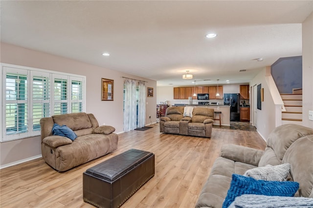 living room featuring light hardwood / wood-style floors