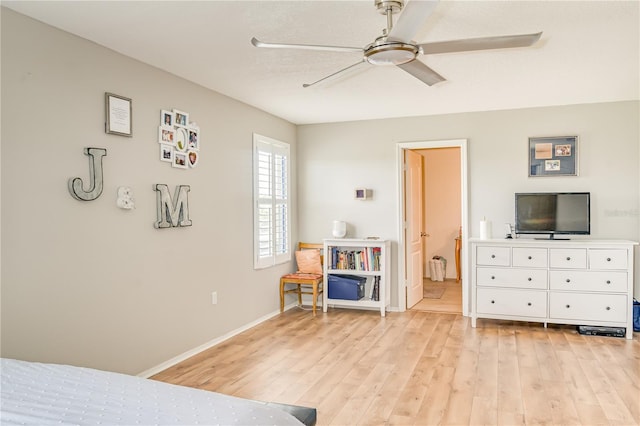 bedroom featuring light wood-type flooring and ceiling fan