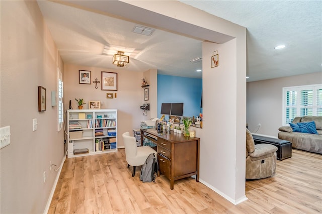 office area featuring recessed lighting, wood finished floors, visible vents, and baseboards