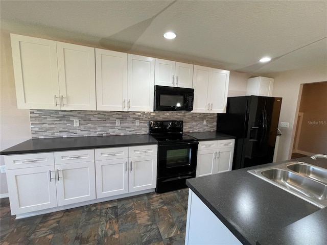 kitchen with a sink, decorative backsplash, black appliances, dark countertops, and white cabinets