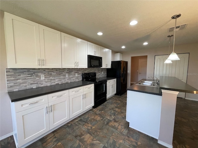 kitchen with recessed lighting, a sink, black appliances, backsplash, and dark countertops