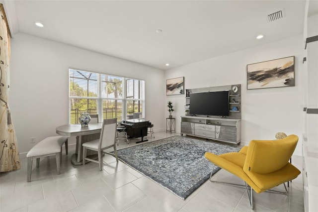 living room featuring light tile patterned flooring