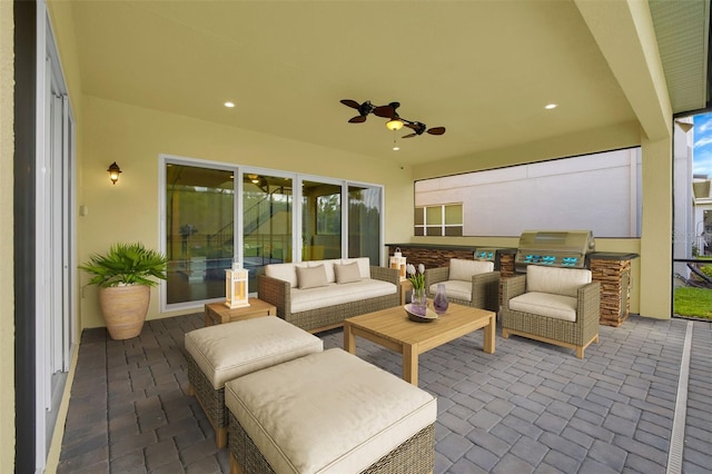 view of patio / terrace featuring ceiling fan, a grill, and an outdoor hangout area