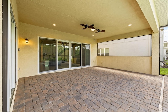 view of patio / terrace featuring ceiling fan