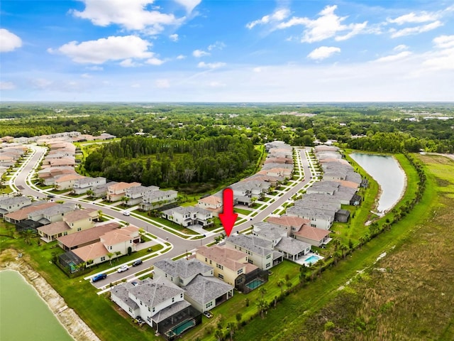 drone / aerial view with a water view