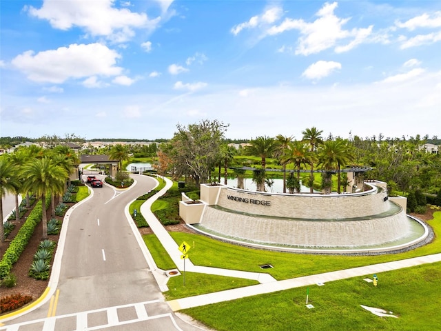 view of home's community featuring a water view