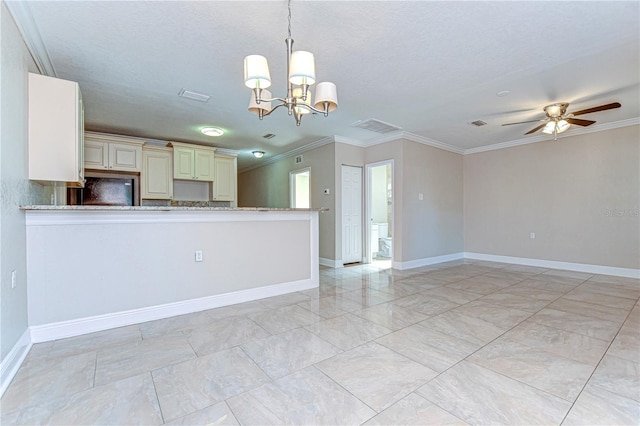 kitchen with kitchen peninsula, pendant lighting, ceiling fan with notable chandelier, and ornamental molding