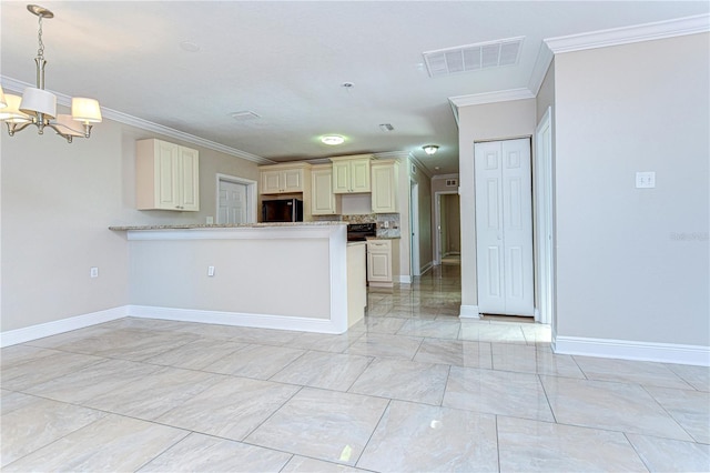 kitchen with crown molding, black appliances, cream cabinets, pendant lighting, and an inviting chandelier