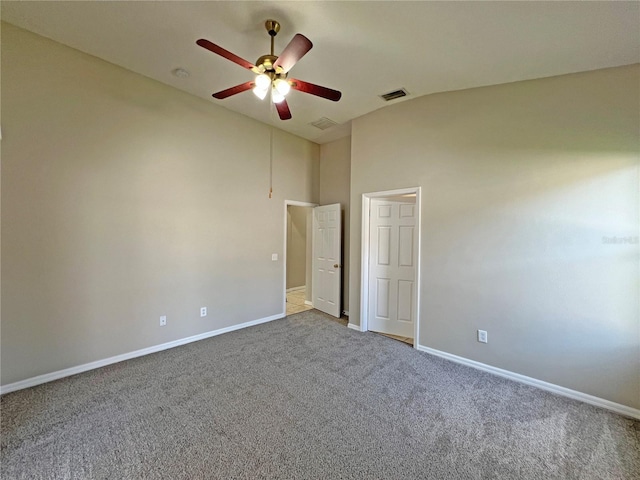 interior space with carpet flooring, ceiling fan, and lofted ceiling