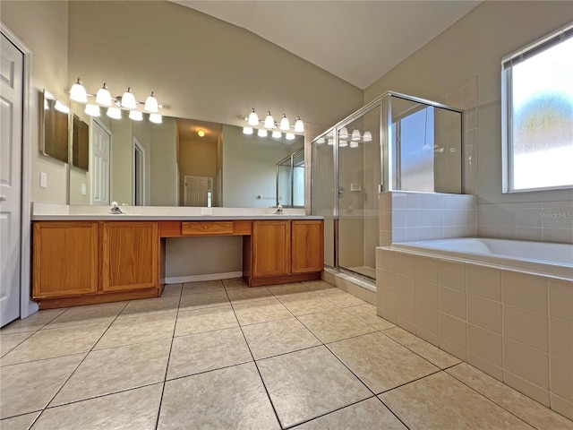 bathroom with tile patterned floors, vanity, and independent shower and bath