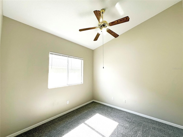 unfurnished room featuring carpet, ceiling fan, and lofted ceiling