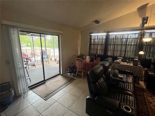 sunroom featuring lofted ceiling