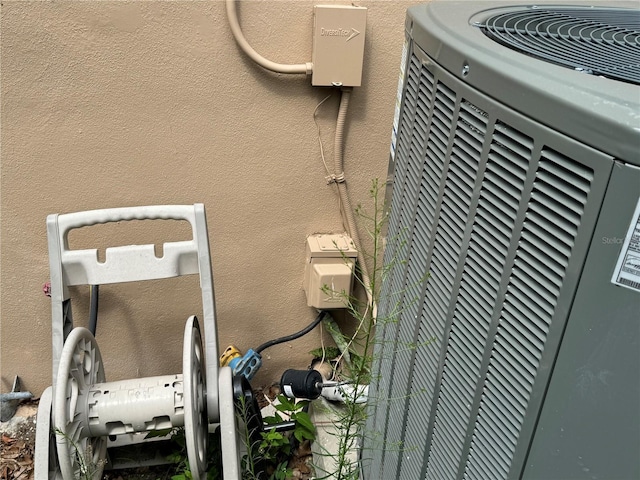 exterior details featuring central AC unit