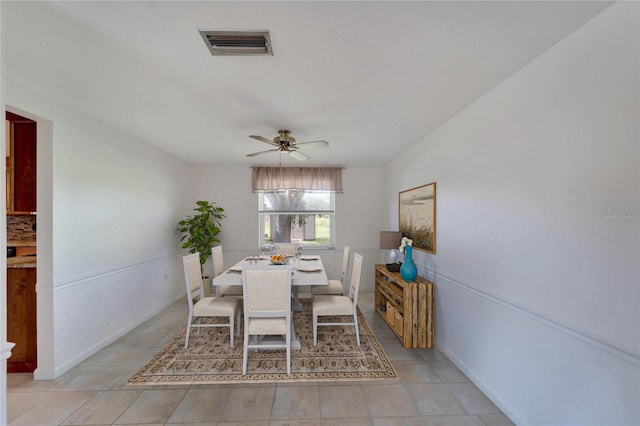 dining space featuring ceiling fan