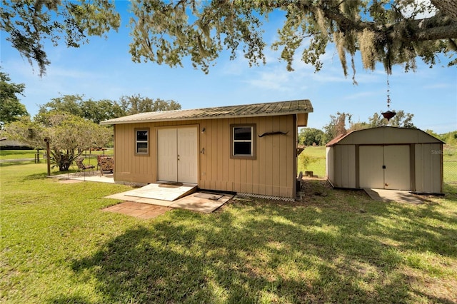 view of outdoor structure with a yard