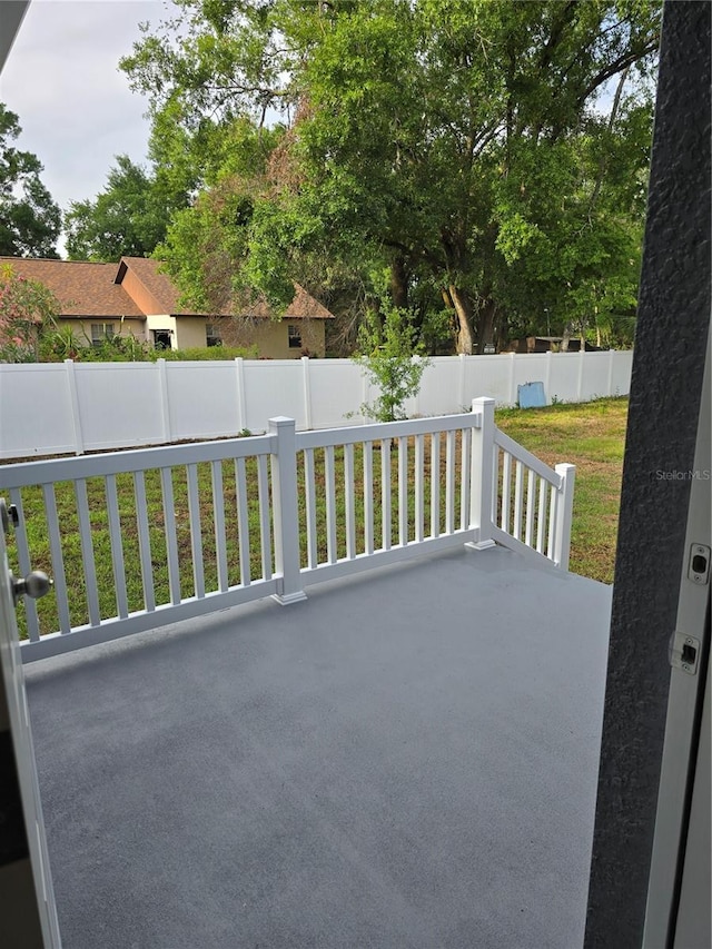 view of patio with fence
