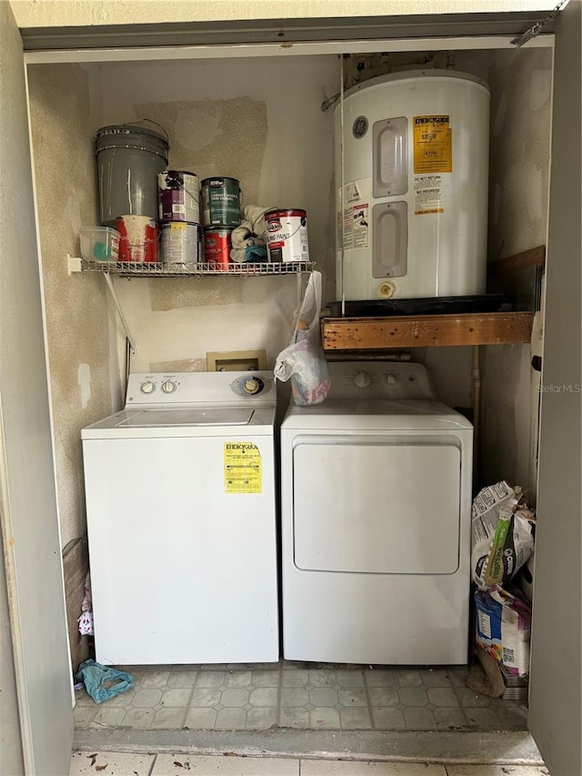 clothes washing area featuring independent washer and dryer