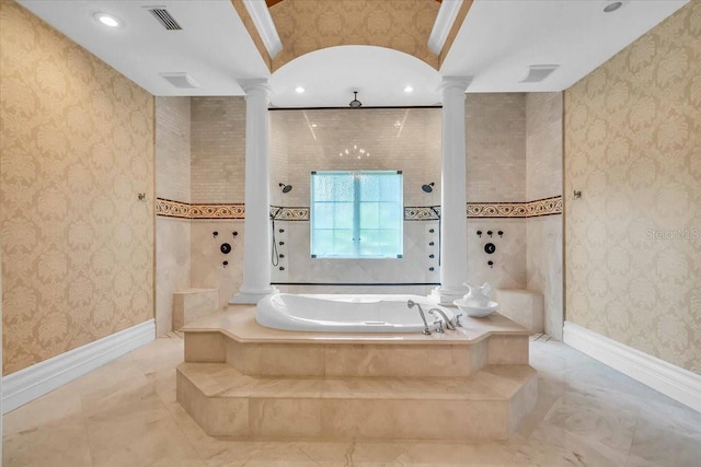 bathroom featuring separate shower and tub and decorative columns