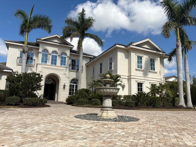 view of front of property with a balcony