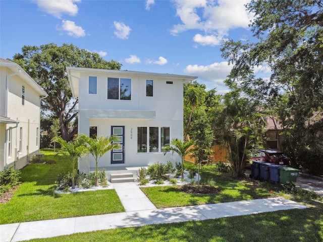 2909 W Spruce St, Tampa, FL 33607 - contemporary home with a front lawn and stucco siding
