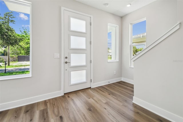 2909 W Spruce St, Tampa, FL 33607 - foyer with wood finished floors