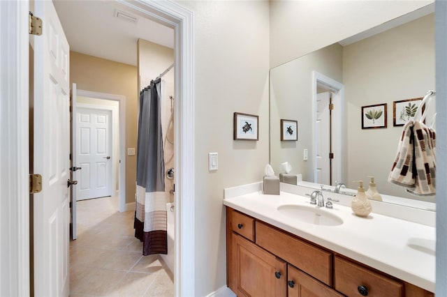 bathroom featuring vanity and tile patterned flooring