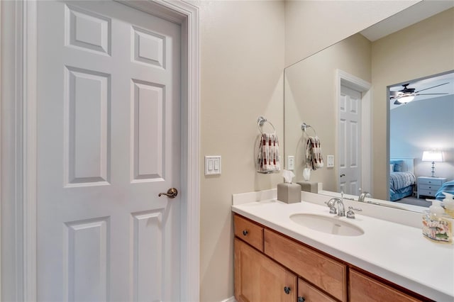 bathroom featuring ceiling fan and vanity