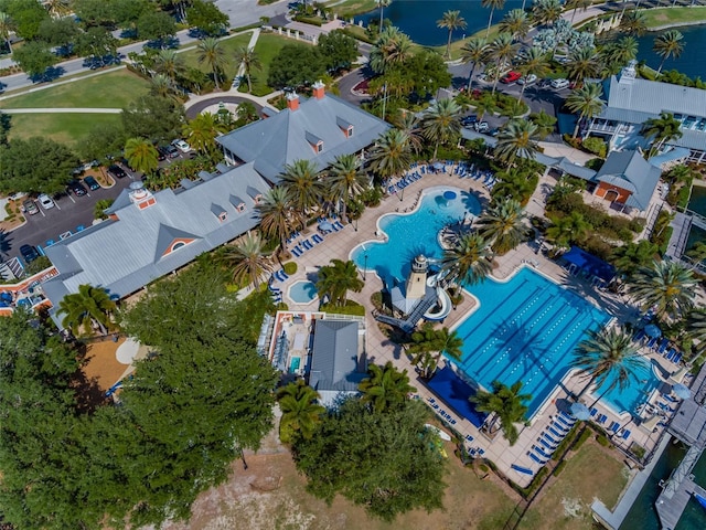 birds eye view of property with a water view